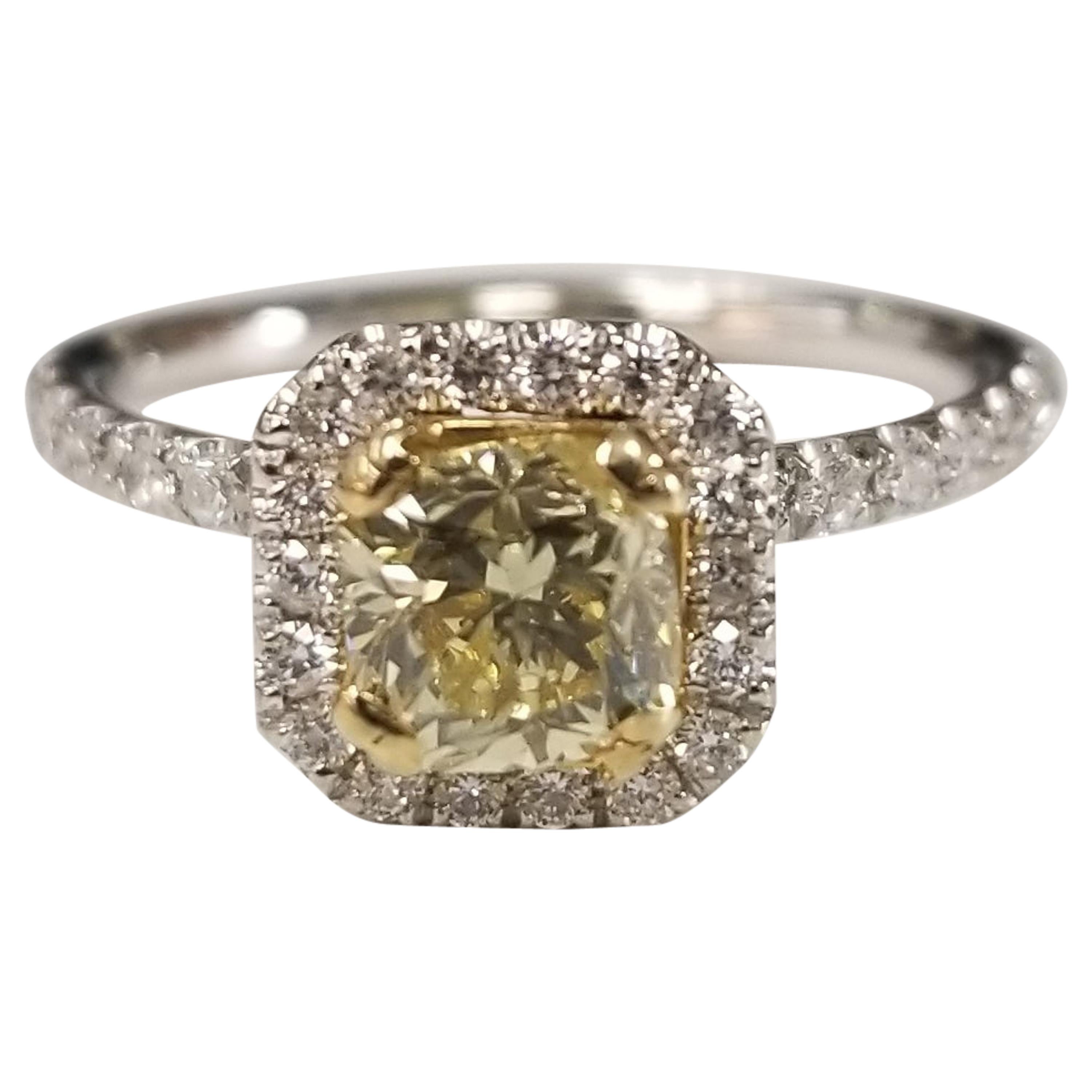 14 Karat White Gold GIA .90pts, Natural Fancy Yellow Diamond Halo Ring