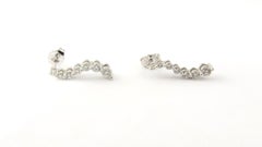 14 Karat White Gold Graduated Diamond Wave Earrings