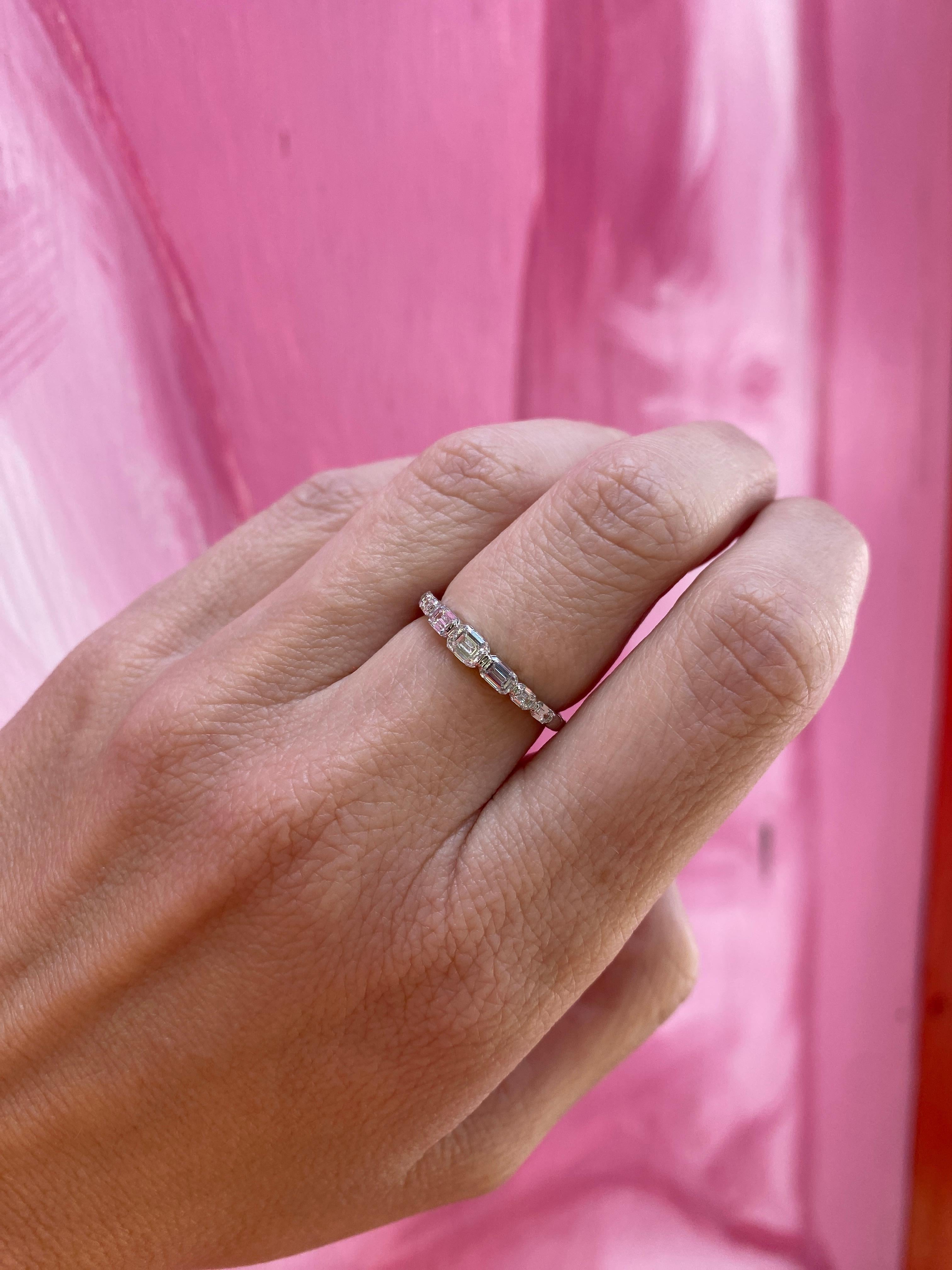 14 Karat White Gold Graduated Emerald Cut Diamond Band For Sale 1