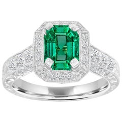 14 Karat White Gold Green Emerald Vintage Halo Diamond Ring 
Center, 1.43 Carat
