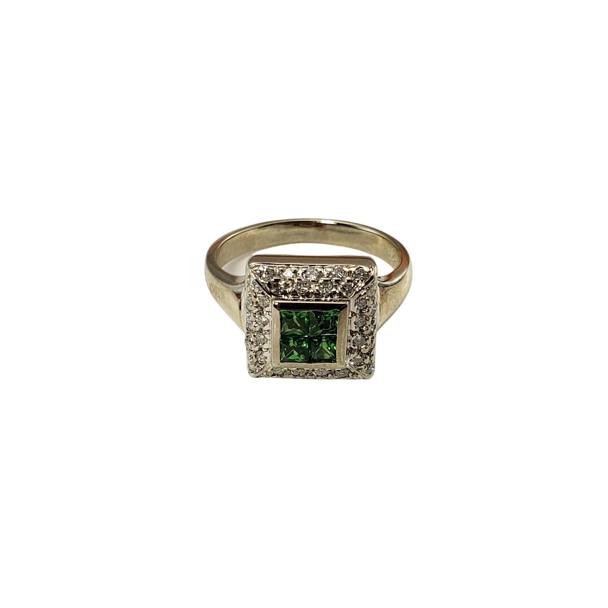 14 Karat White Gold Green Tourmaline and Diamond Ring Size 6.5 GAI Certified-

This stunning ring features four princess cut green tourmaline gemstones and 36 round brilliant cut diamonds set in classic 14K white gold.  Width:  11 mm.  Shank:  2.5