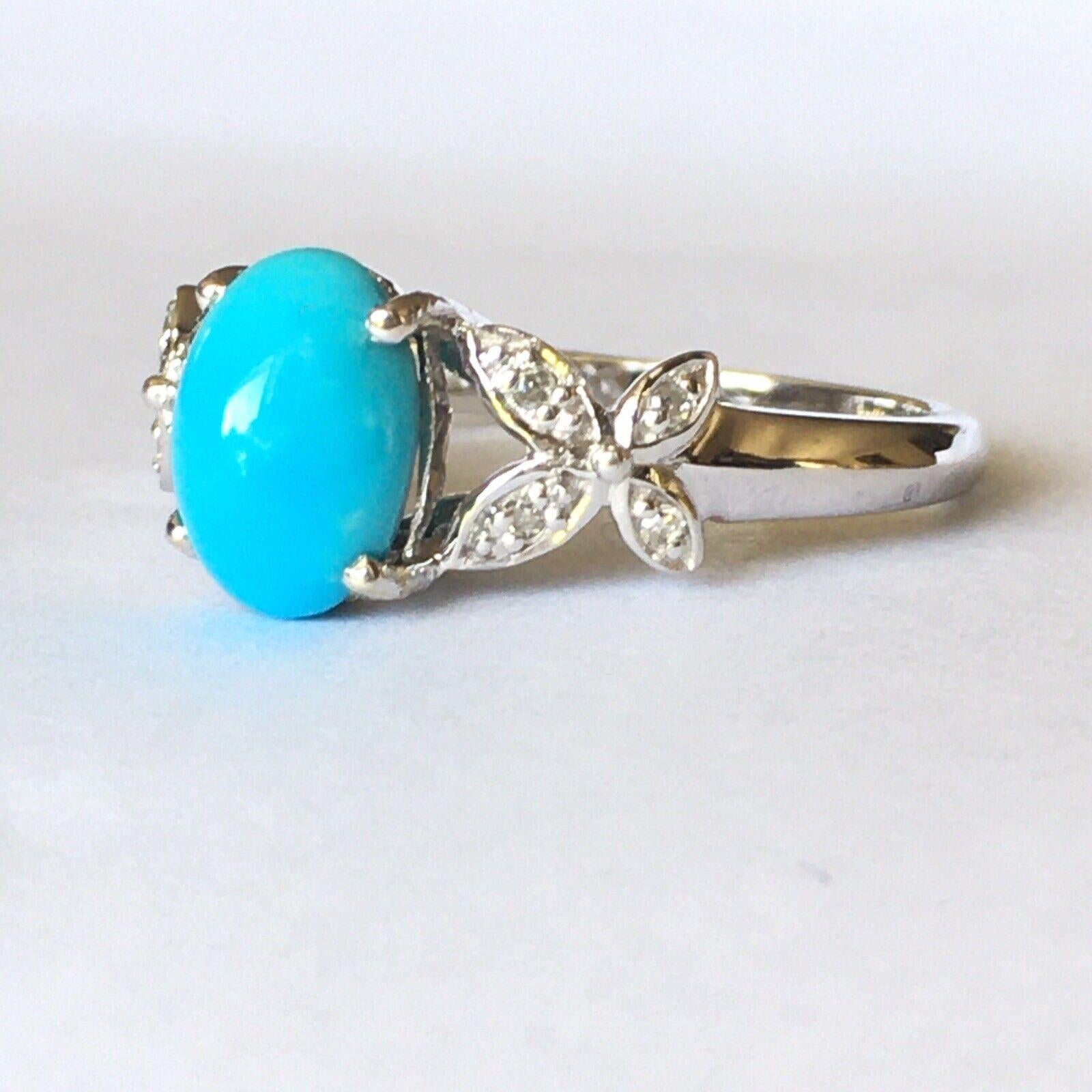 14 Karat Yellow Gold Lady's Turquoise Ring

14 Karat White gold Lady's Diamond Turquoise ring circa 1970s, 8.5mm by 6mm Oval Cabochon cut Turquoise 8 pieces of Full Cut diamonds approximate TDW 1/10 Carat , in excellent condition considering the