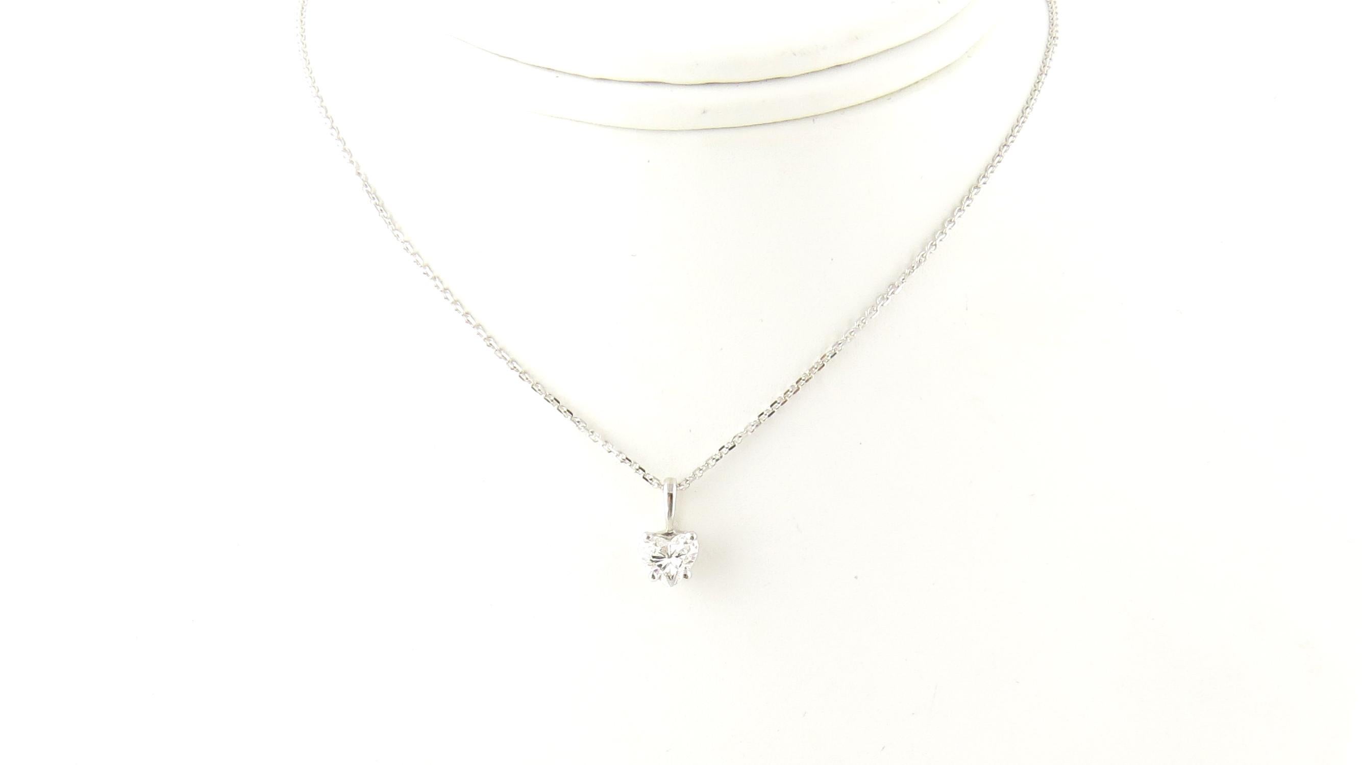 Vintage 14 Karat White Gold Heart Diamond Pendant Necklace

This stunning pendant features one heart shaped diamond (.46 ct.) suspended from a classic 14K white gold necklace.

Approximate total diamond weight: .46 ct.

Diamond clarity: SI2

Diamond
