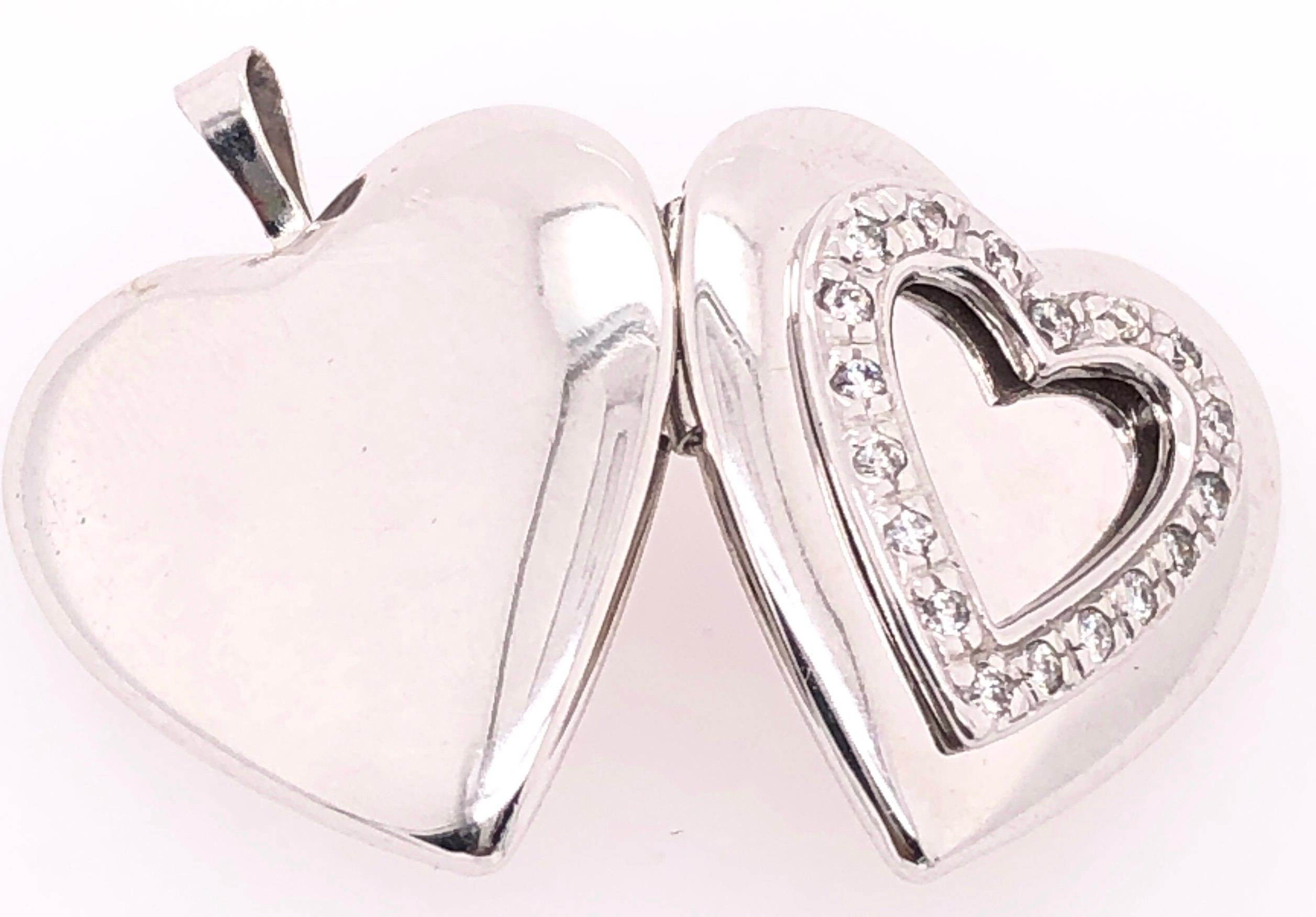 Contemporary 14 Karat White Gold Heart Locket Pendant with Diamonds For Sale