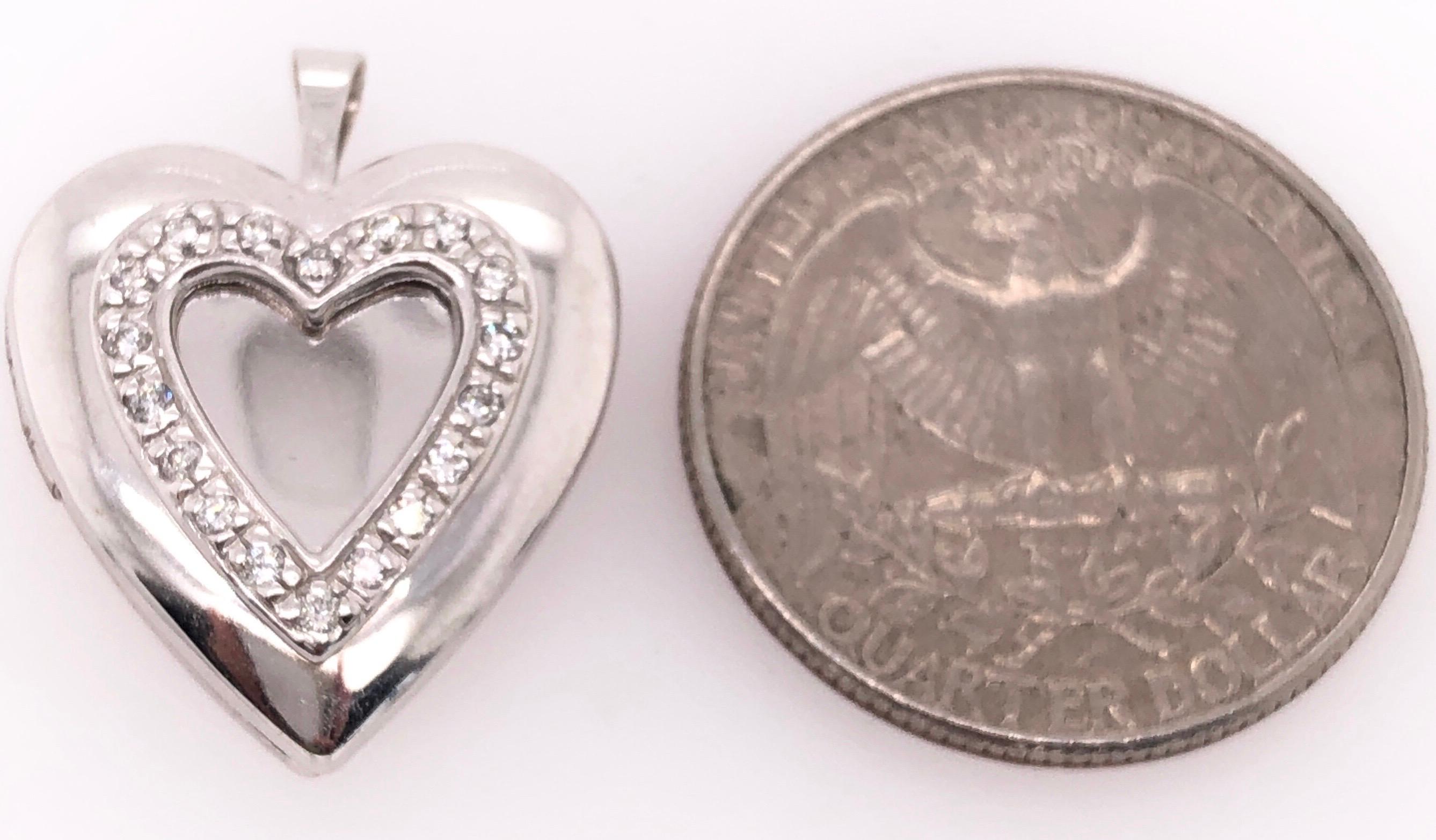 Round Cut 14 Karat White Gold Heart Locket Pendant with Diamonds For Sale