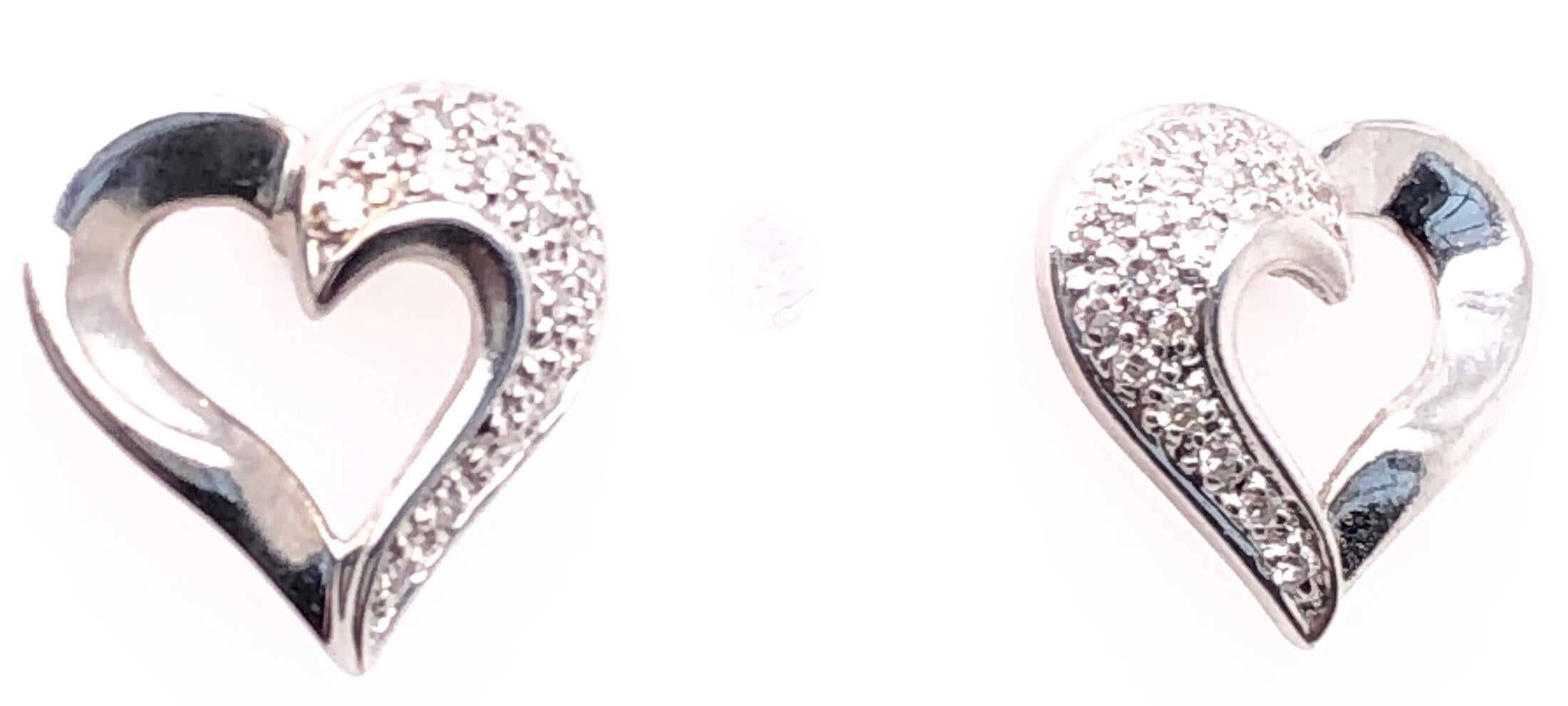 14 Karat White Gold Heart Shape Earrings with Diamonds.
1.00 total diamond weight.
2.74 grams total weight.