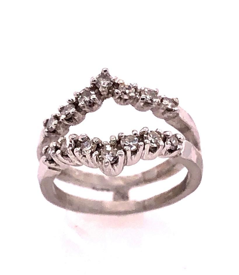 14 Karat White Gold Interlocking Engagement Ring Guard Size 4.75.
14 round diamonds.
5.7 grams total weight.
ring space height 3.5 mm
