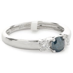 14 Karat White Gold Irradiated Blue and White Diamond Three Stone Ring
