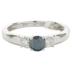 14 Karat White Gold Irradiated Blue and White Diamond Three Stone Ring