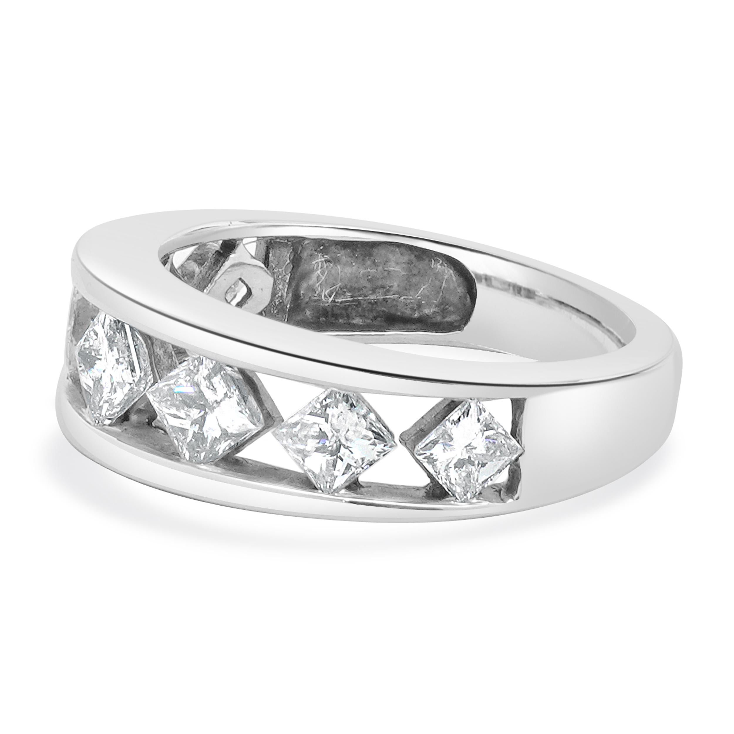 Designer: custom
Material: 14K white gold
Diamond: 7 princess cut = 1.03cttw
Color: H 
Clarity: SI2
Ring size: 4.5 (please allow two additional shipping days for sizing requests)
Weight: 3.71 grams