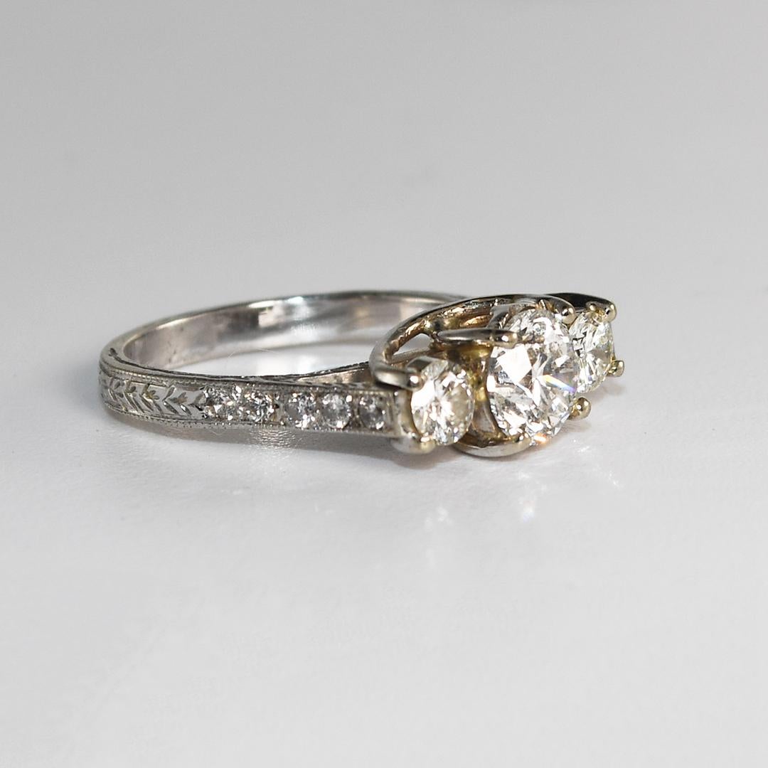 Brilliant Cut 14 Karat White Gold Ladies Three-Stone Diamond Ring with Accents, 1.46 Tdw For Sale