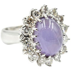 14 Karat White Gold Lavender Star Sapphire with Floral Style Diamond Halo Ring