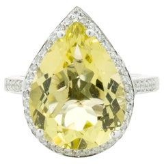 Anillo de oro blanco de 14 quilates con cuarzo limón y diamantes en forma de pera