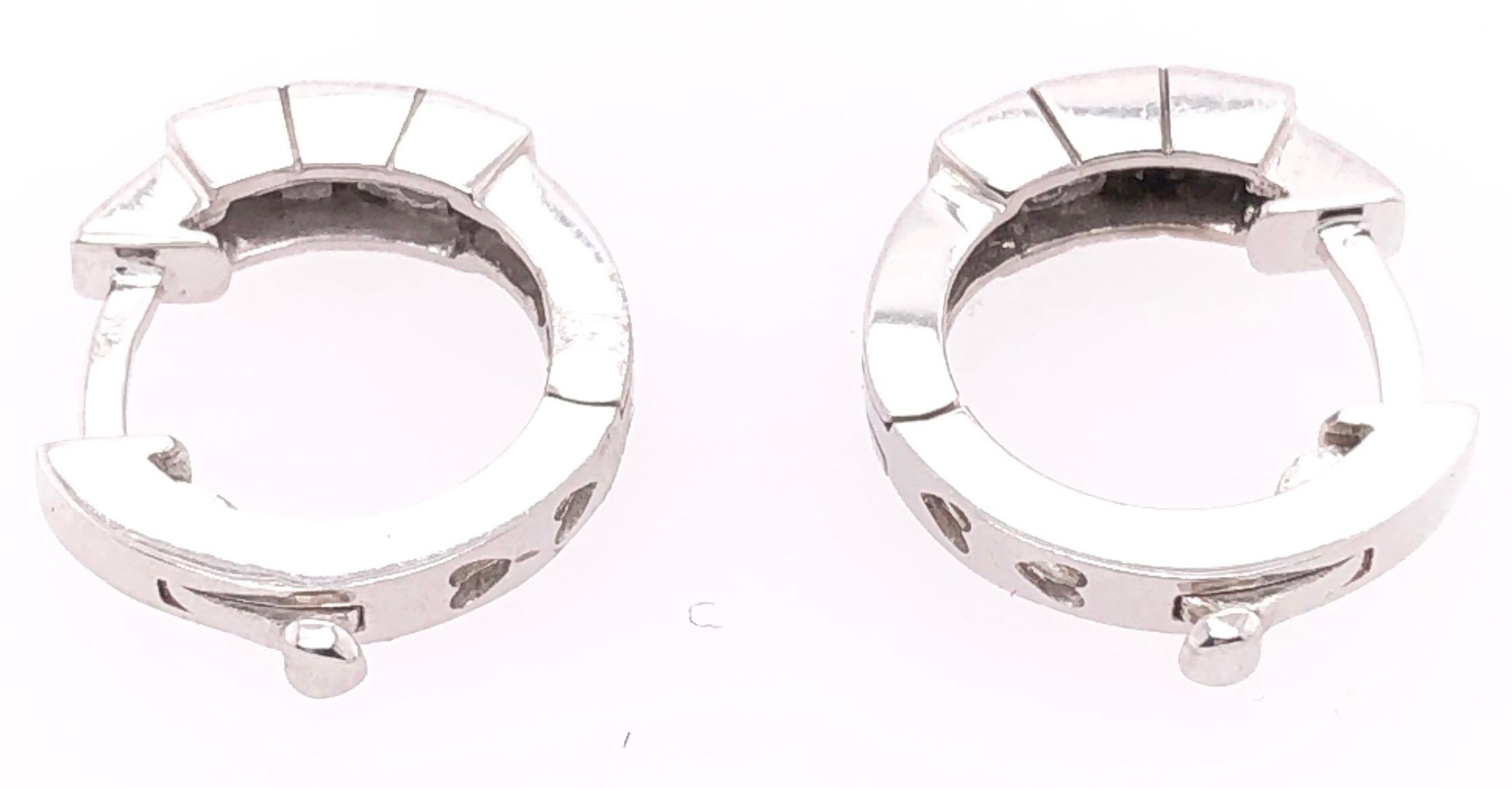 14 Karat White Gold Lever Back Hoop Earrings with Round Diamonds .
0.03 total diamond weight.
3.28 grams total weight.