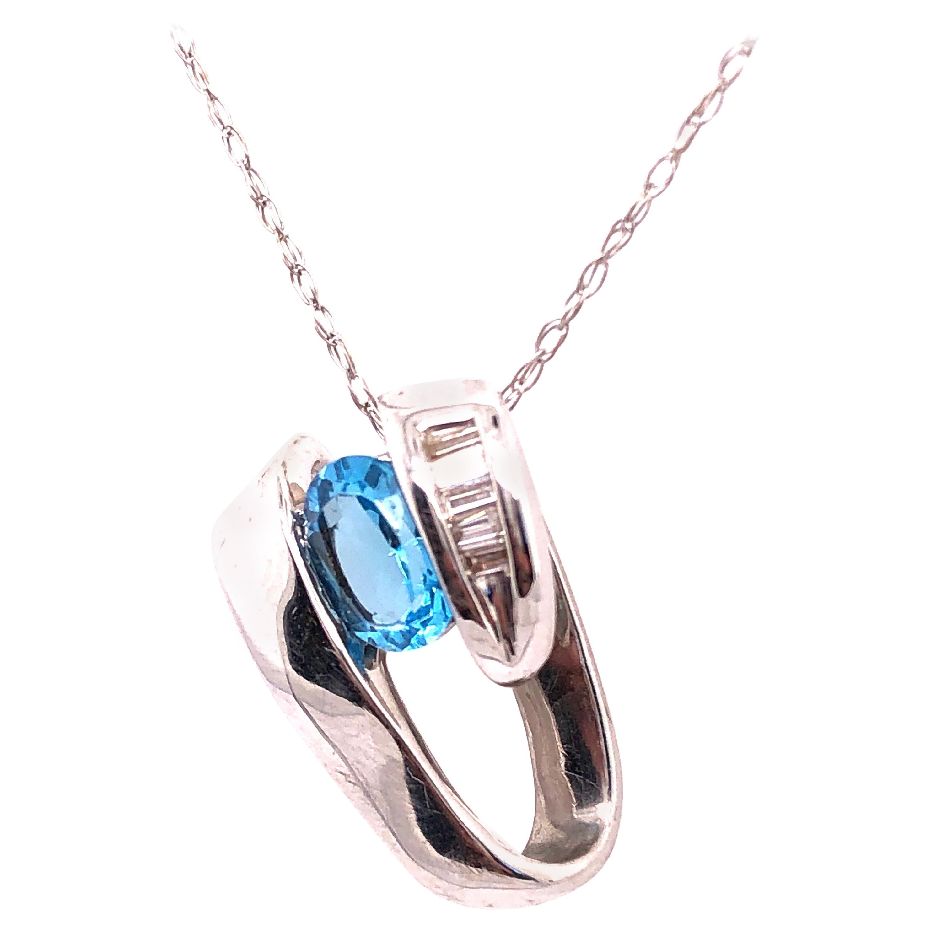 14 Karat White Gold Link with Oval Blue Topaz and Baguette Diamonds