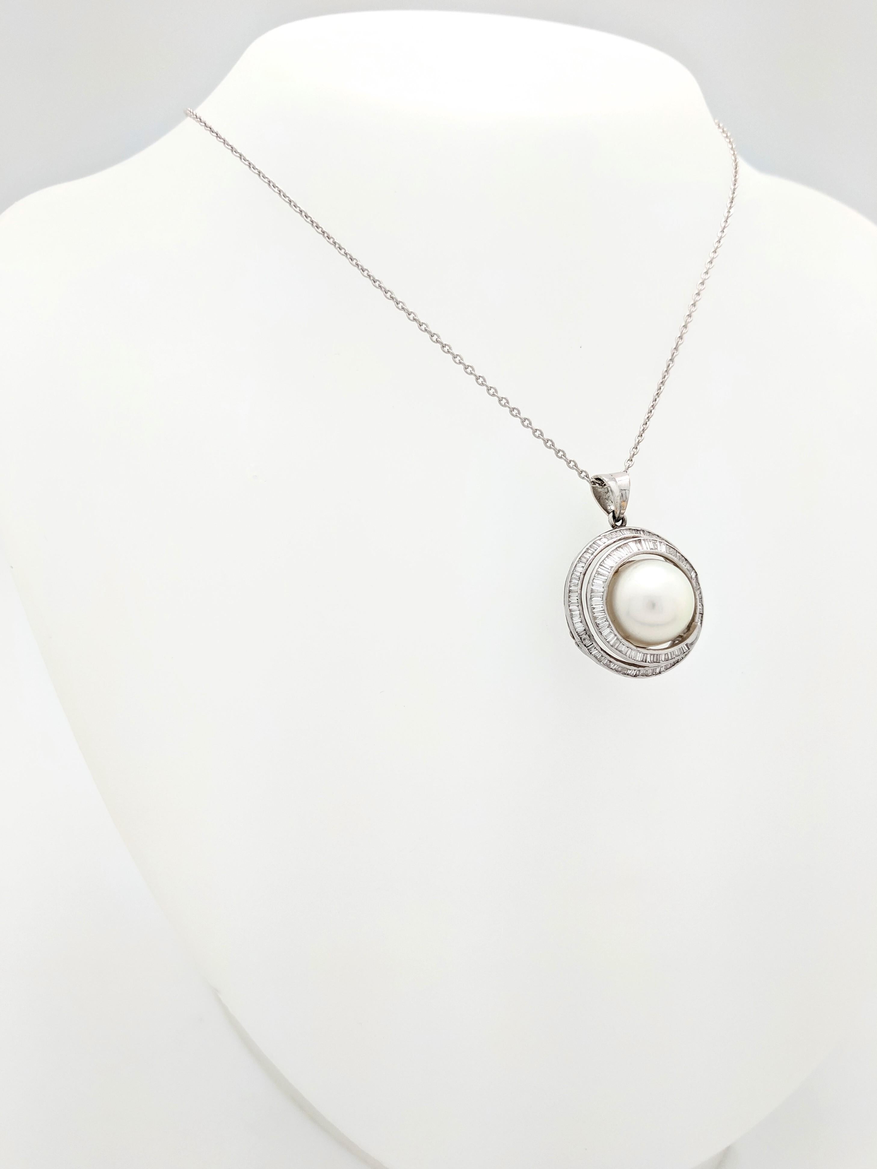 Art Deco 14 Karat White Gold Mabe Pearl and Baguette Cut Diamond Swirl Pendant Necklace For Sale
