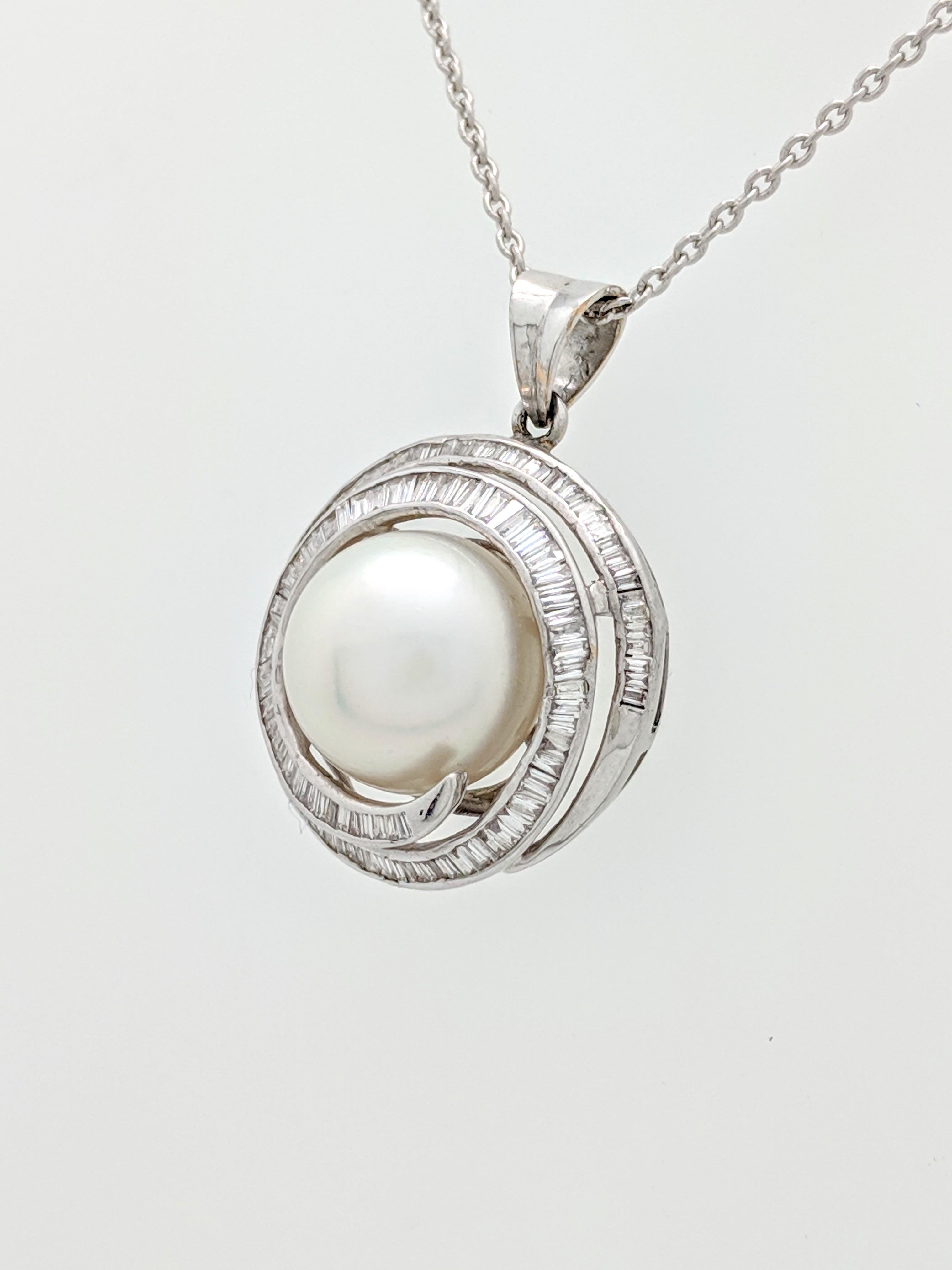 Women's 14 Karat White Gold Mabe Pearl and Baguette Cut Diamond Swirl Pendant Necklace For Sale