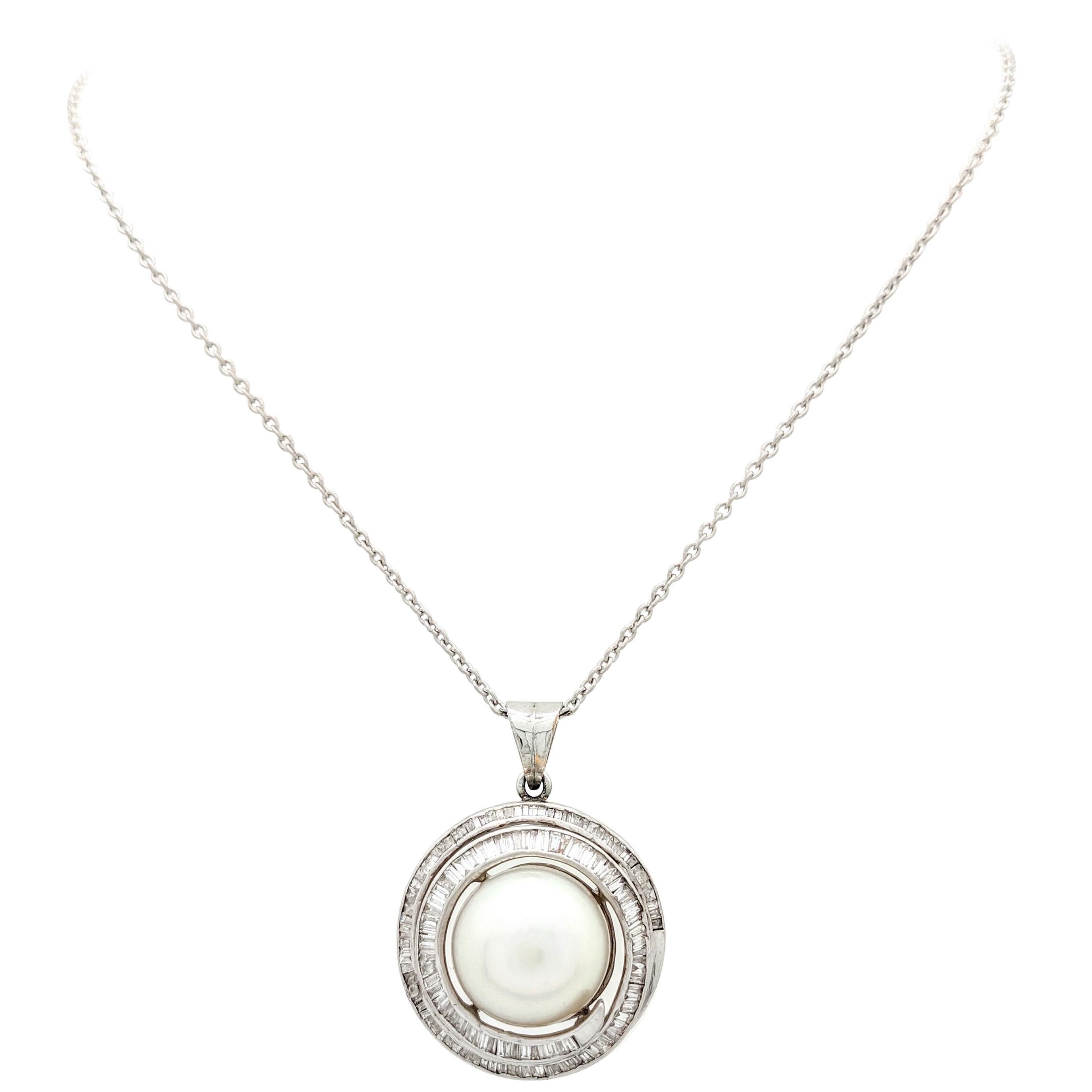 14 Karat White Gold Mabe Pearl and Baguette Cut Diamond Swirl Pendant Necklace For Sale