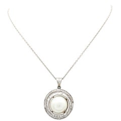 Retro 14 Karat White Gold Mabe Pearl and Baguette Cut Diamond Swirl Pendant Necklace