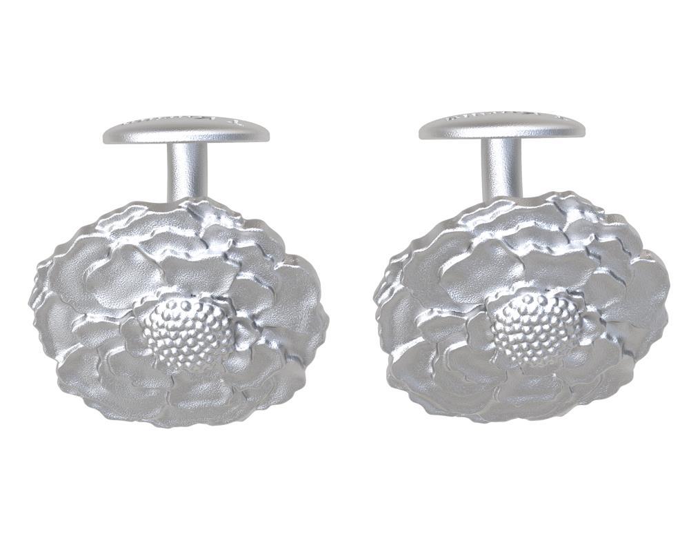 14 Karat White Gold Marigold Cuff links Tiffany designer Thomas Kurilla sculpted these marigolds exclusively for 1stdibs. Beginning with a fabulous flower, the marigold we get a great design for a cuff links. Matte 14k  white gold. Made to order