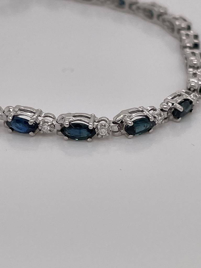22 pieces of marquise sapphires weighing 4.76 cts
Measuring (5.0x2.5) mm
22 pieces of round diamonds weighing .21 cts
Set in 14K white gold bracelet
Weighing 6.50 grams