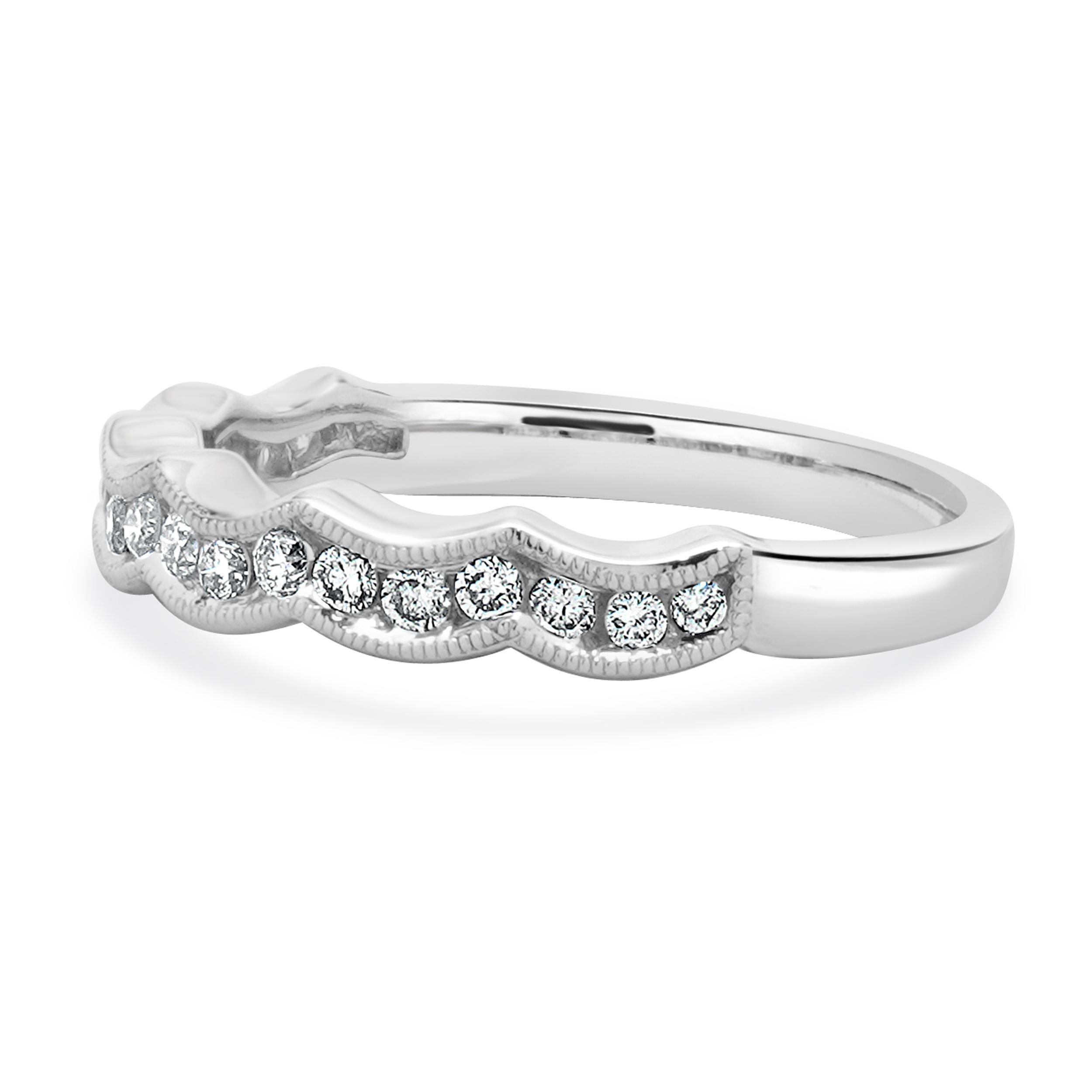Designer: custom
Material: 14K white gold
Diamond: 18 round brilliant cut = 0.36cttw
Color: H/I
Clarity: SI1-2
Ring size: 6 (please allow two additional shipping days for sizing requests)
Weight: 2.48 grams