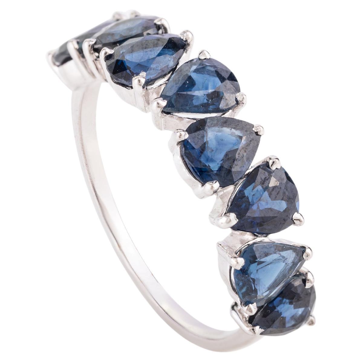 For Sale:  14 Karat White Gold Modern Pear Cut Blue Sapphire Half Band Engagement Ring