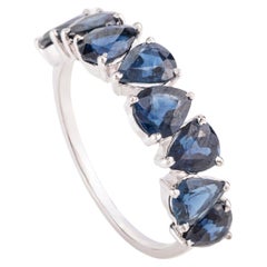 14 Karat White Gold Modern Pear Cut Blue Sapphire Half Band Engagement Ring