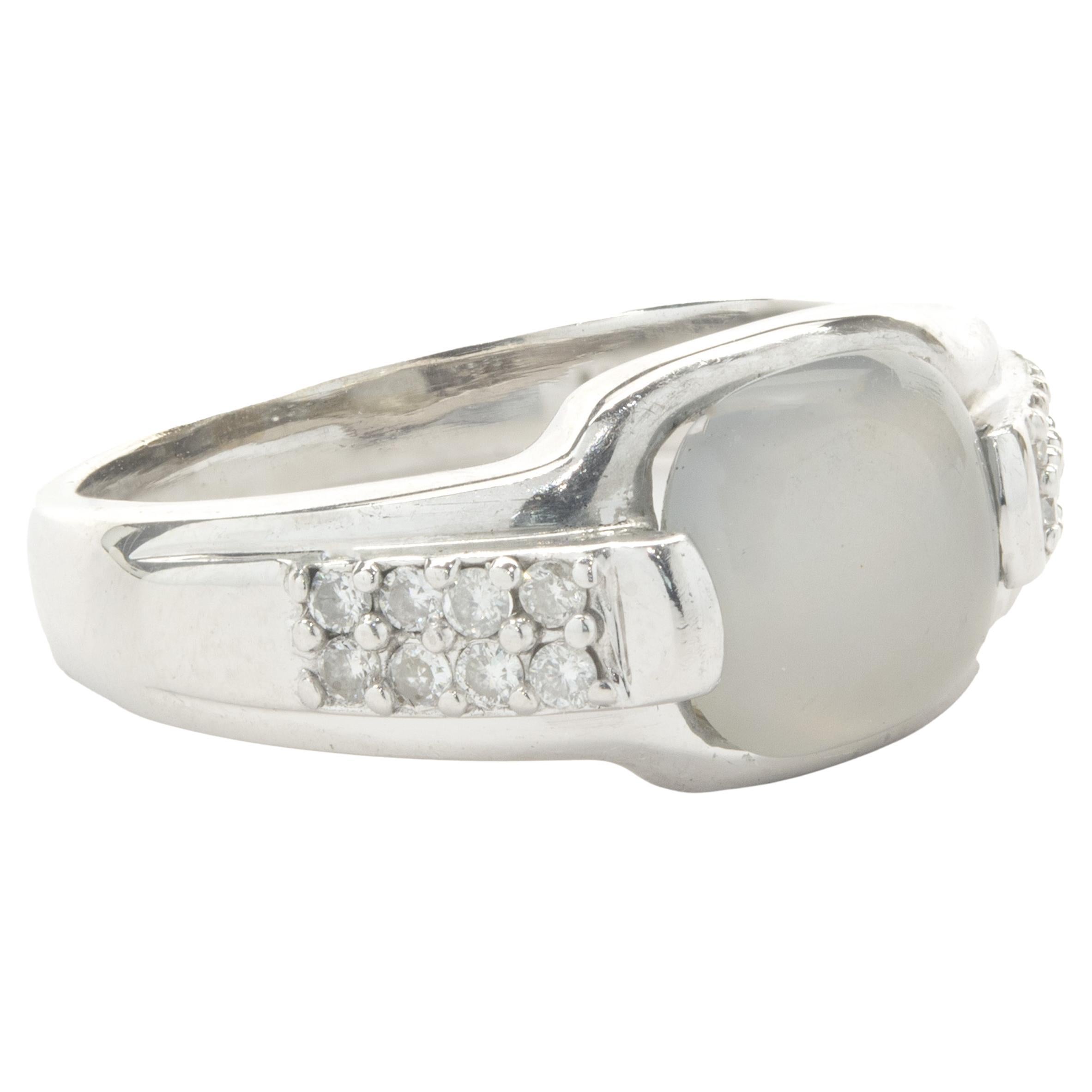 Designer: custom
Material: 14K white gold
Diamond: round brilliant cut = .32cttw
Color: G
Clarity: SI1
Dimensions: ring top measures 9.4mm wide
Ring Size: 7 (complimentary sizing available)
Weight: 4.67 grams