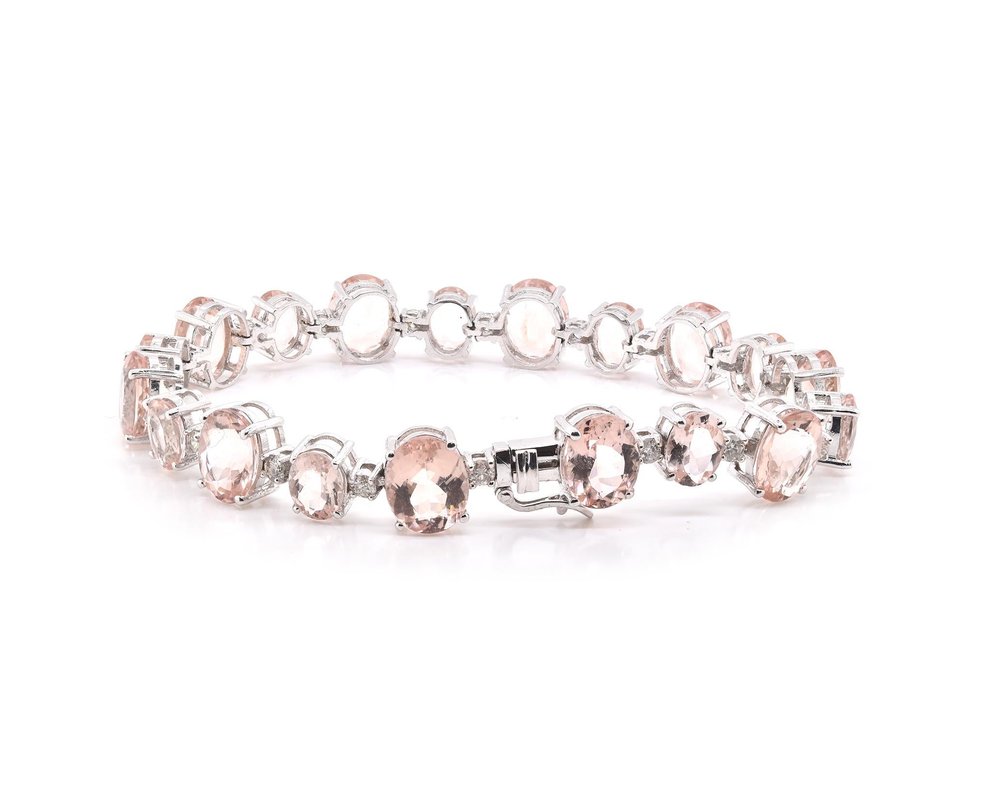 Designer: custom
Material: 14K white gold
Morganite: 19 oval cut = 34.44cttw
Diamond: 19 round brilliant cut = 1.33cttw
Color: G
Clarity: SI1
Dimensions: bracelet measures 7-inches
Weight: 23.38 grams
