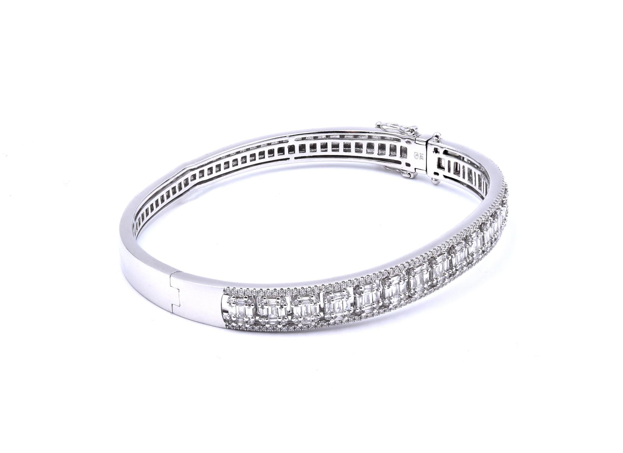 Material: 14K White Gold
Diamonds: 85 baguette cut = .79cttw
Color: G
Clarity: VS
Diamonds: 228 round cut = .64cttw
Color: G
Clarity: VS
Dimensions: bracelet will fit up to a 7-inch wrist
Weight: 17.37 grams
