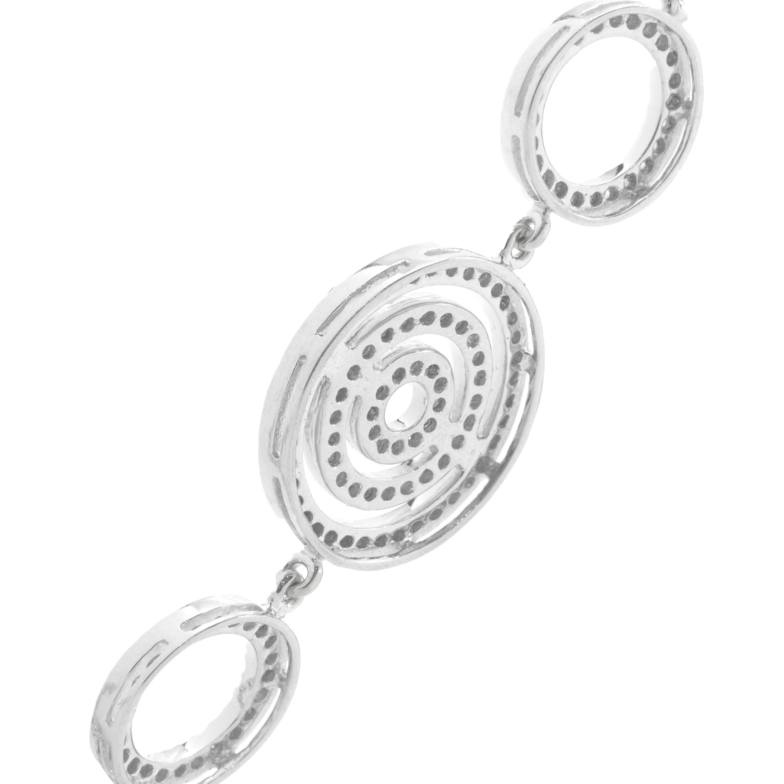 Designer: custom
Material: 14K white gold
Diamonds: 243 round brilliant cut = 3.64cttw
Color: H
Clarity: SI2
Dimensions: bracelet will fit up to a 7.25-inch wrist
Weight: 15.09 grams
