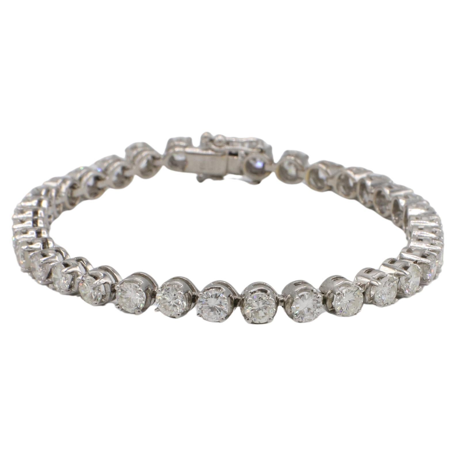 14 Karat White Gold Natural 8.00 Carat Round Diamond Tennis Line Bracelet 
Metal: 14k white gold
Weight: 14.6 grams
Diamonds: 35 round natural diamonds, approx. 8 CTW G-H VS-SI1
Length: 7 inches
Width: 4.8mm
LDDD F35000567