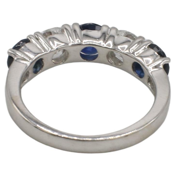 Round Cut 14 Karat White Gold Natural Diamond & Blue Sapphire Half Band Wedding Ring For Sale