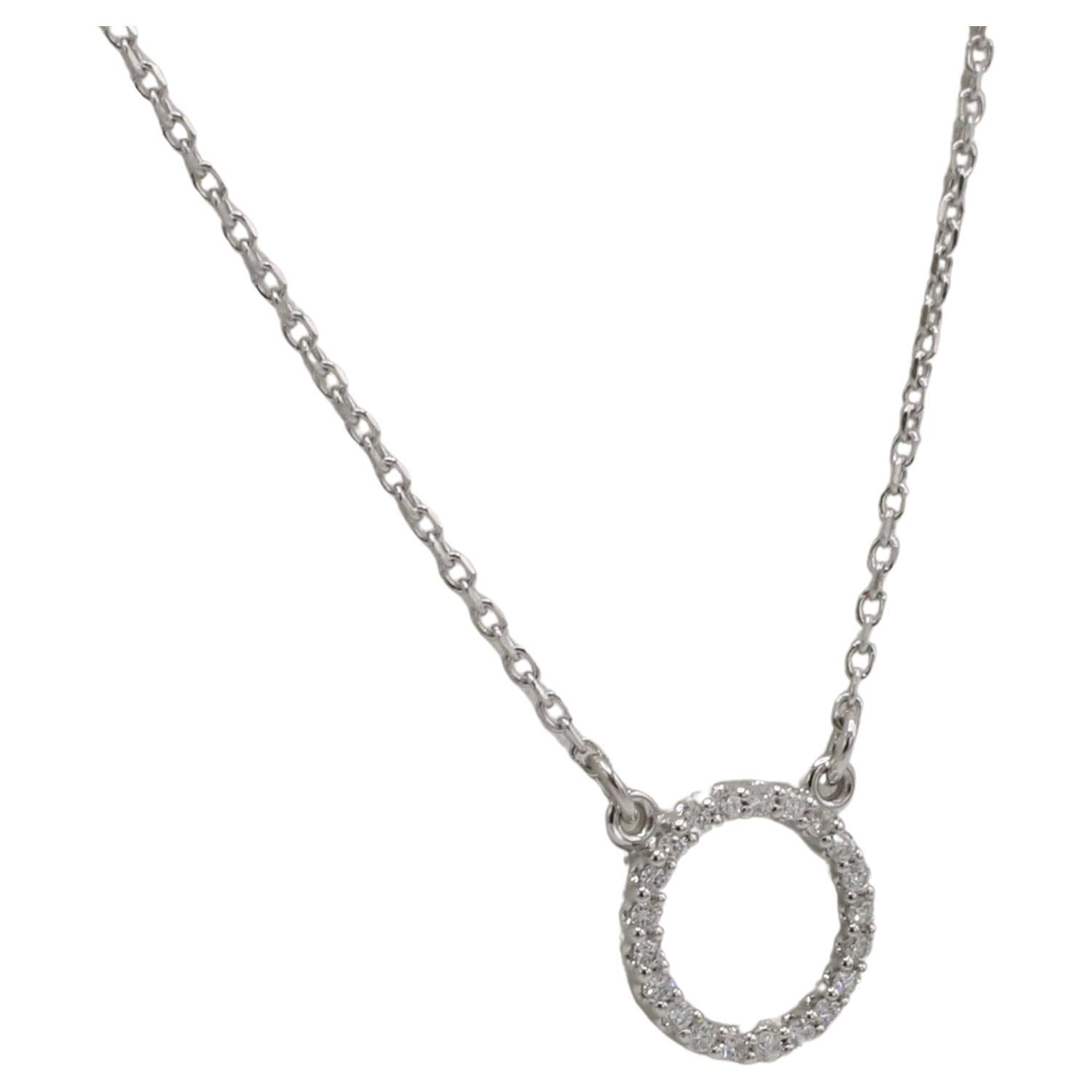 14 Karat White Gold Natural Diamond Circle Pendant Necklace 
Metal: 14k white gold
Weight: 1.47 grams
Diamonds: .08 CTW natural round diamonds G-H SI
Length: 16 inches
Circle: 9mm
Note: Also available in yellow and rose gold 