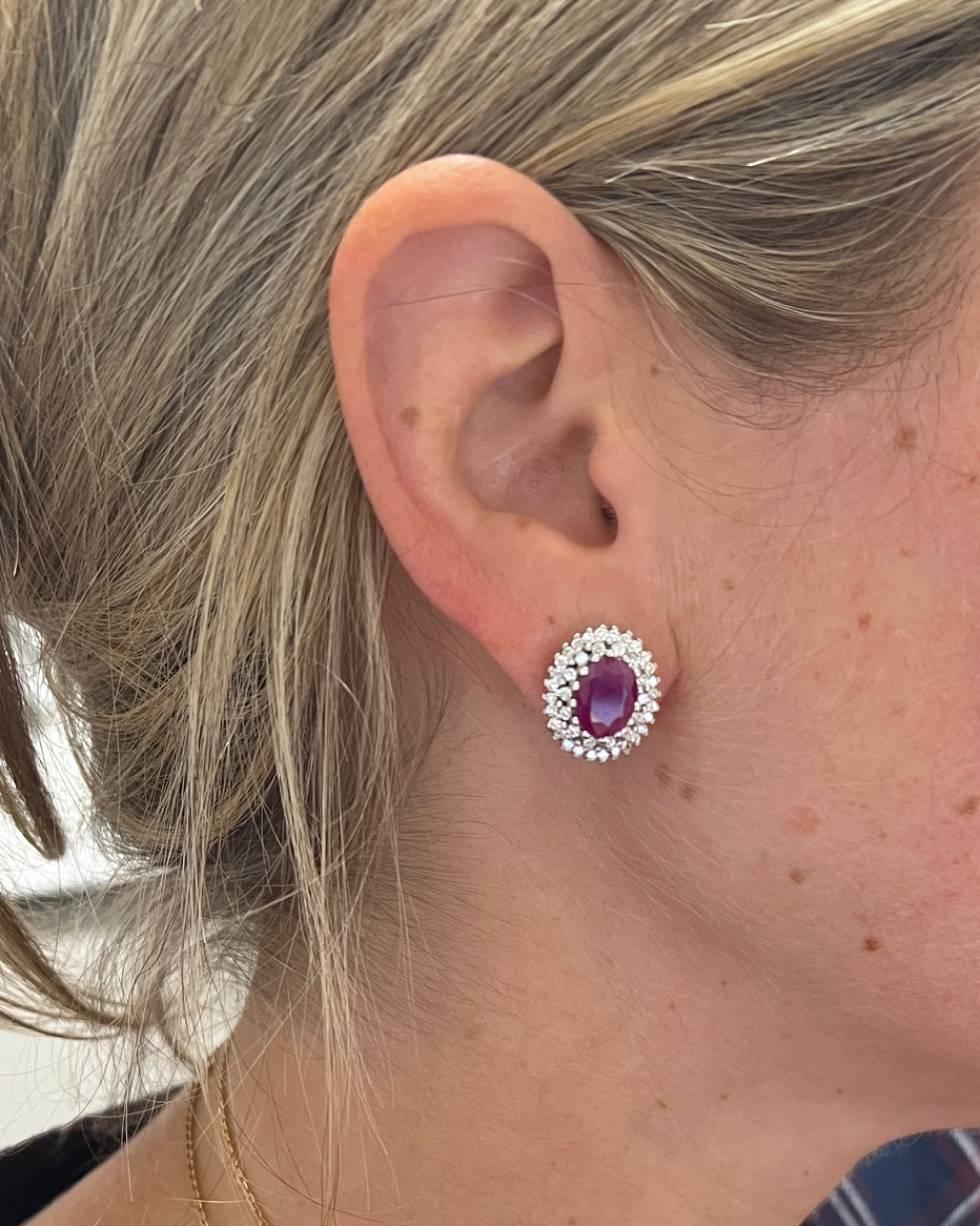 Oval Cut 14 Karat White Gold Natural Ruby & Diamond Halo Earrings