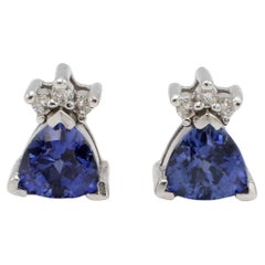 Orecchini a perno in oro bianco 14 carati con tanzanite naturale e diamanti