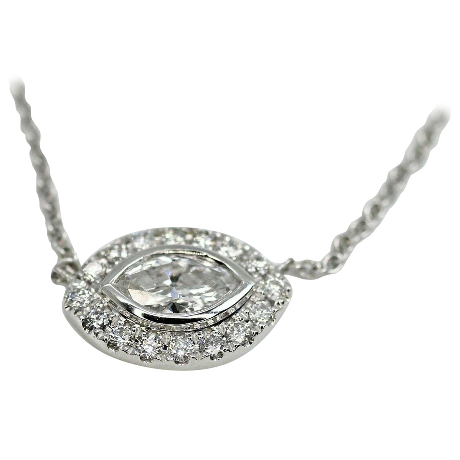 14 Karat White Gold Necklace with a Marquise and Halo For Sale