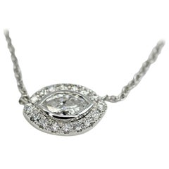 14 Karat White Gold Necklace with a Marquise and Halo