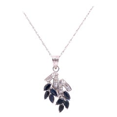 14 Karat White Gold Necklace with Marquise Sapphires and Diamond Pendant