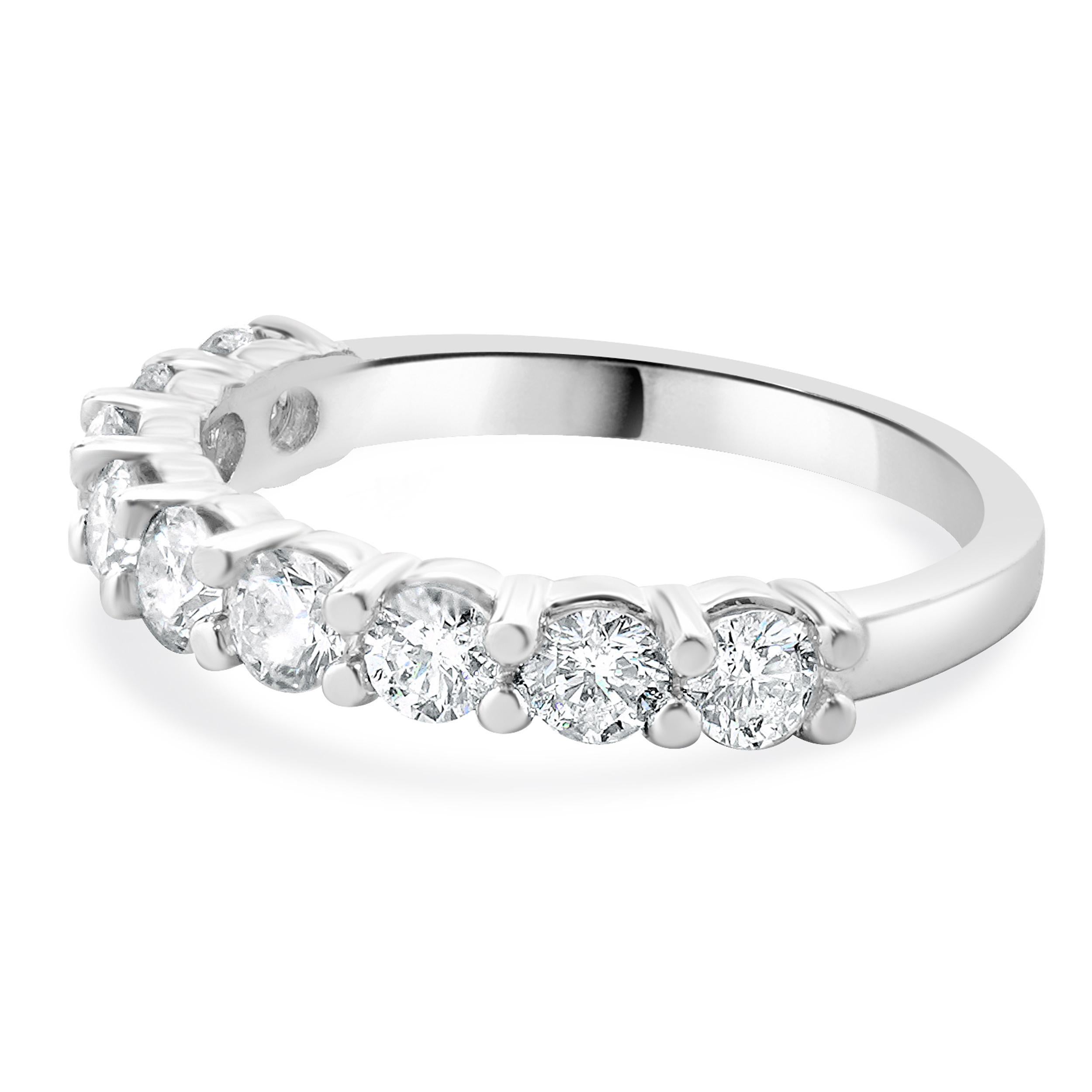Designer: custom
Material: 14K white gold
Diamond: 9 round brilliant cut = 1.00cttw
Color: G
Clarity: SI1
Ring size: 7 (please allow two additional shipping days for sizing requests)
Weight: 6.23 grams