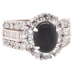 14 Karat White Gold Onyx and Diamond Halo Ring