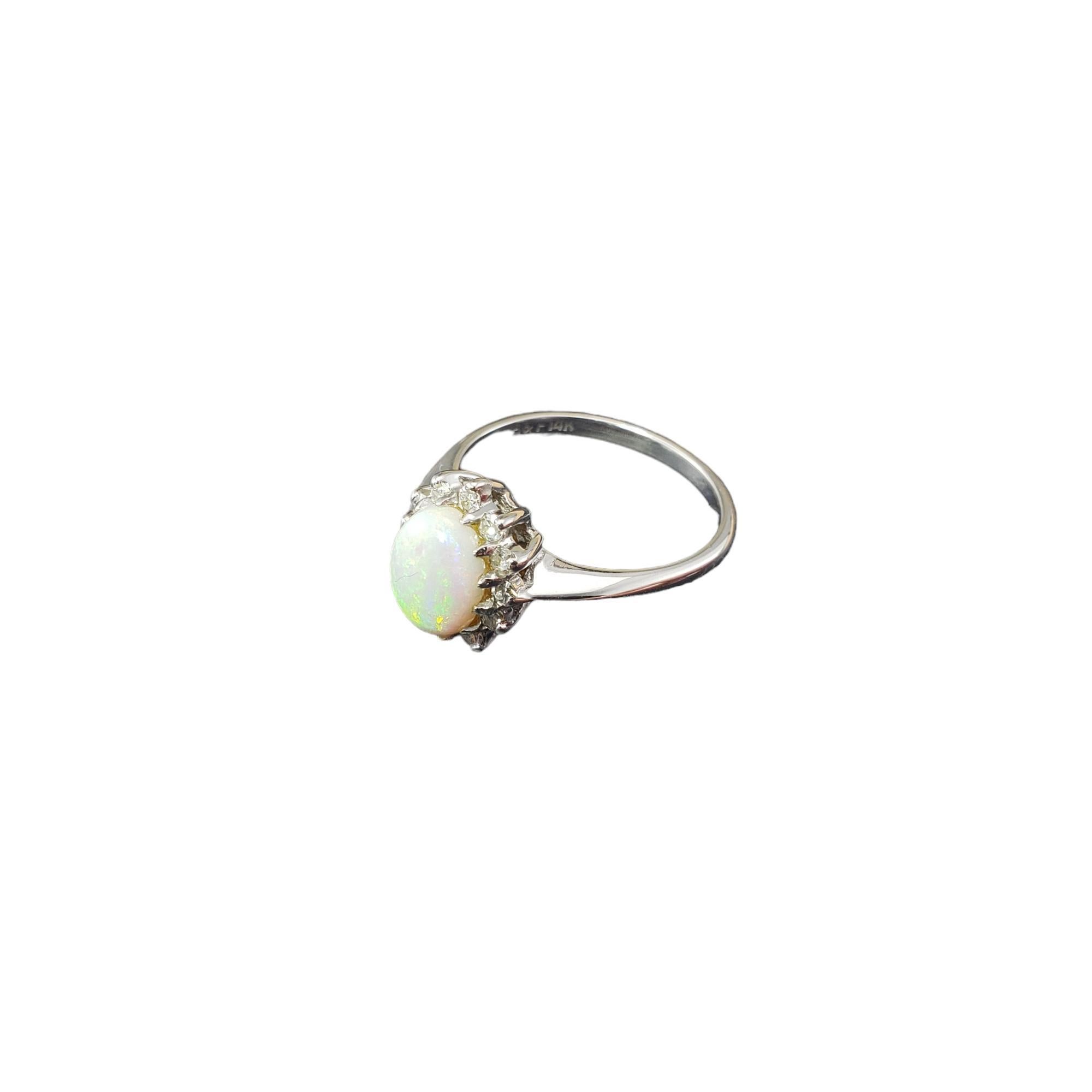 Oval Cut 14 Karat White Gold Opal and Diamond Halo Ring Size 6.25 #17642 For Sale