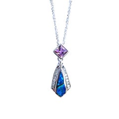14 karat white gold, opal, pink tourmaline, and diamond pendant with chain