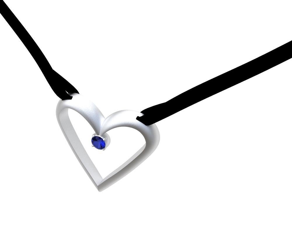 14 Karat White Gold Open Heart with Sapphire Pendant necklace on Black Flat Ultra Suede , 22mm wide x 21.50 mm height . K.I.S.S.- 