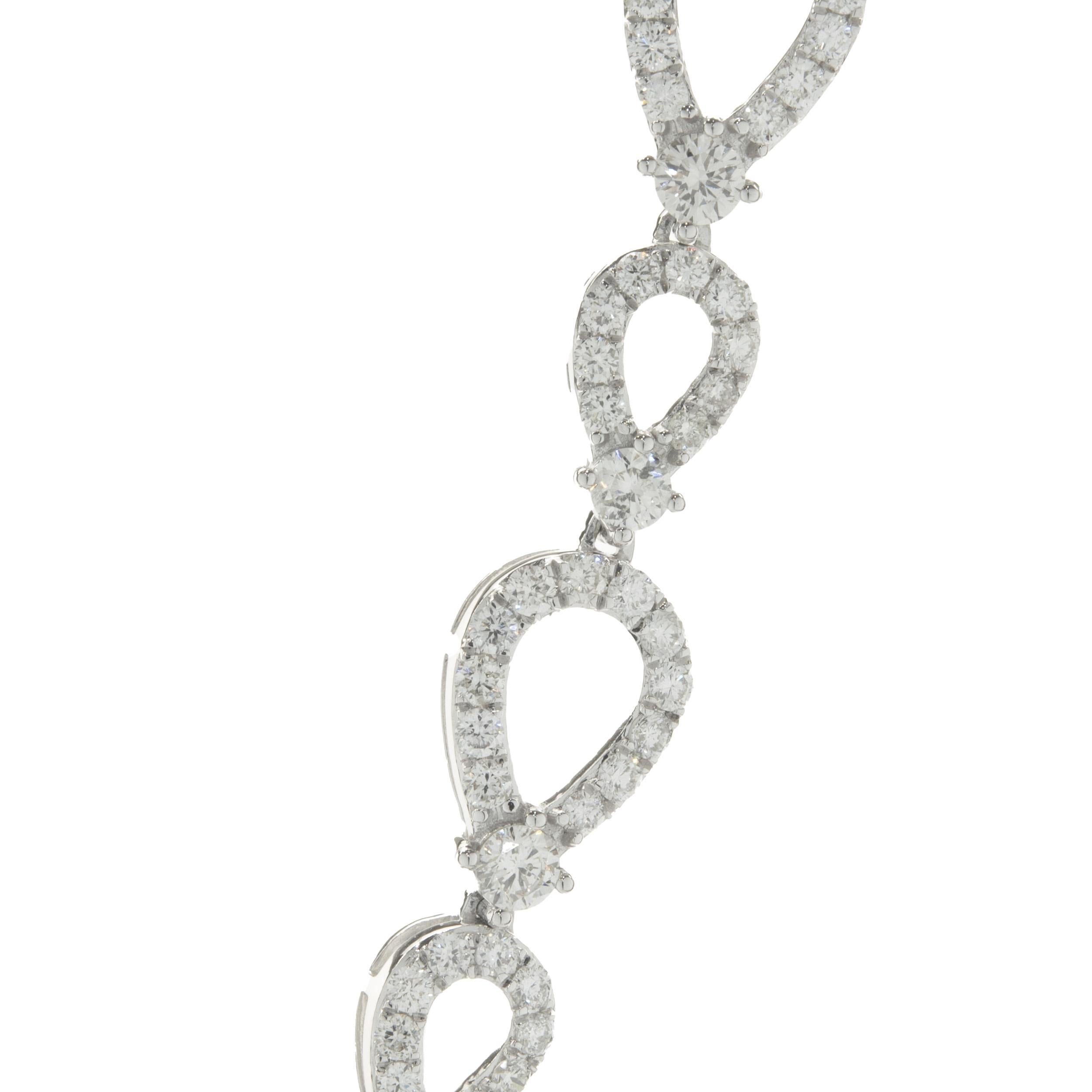 Designer: custom
Material: 14K white gold
Diamonds: round brilliant cut = 8.75cttw 
Color: G
Clarity: VS2-SI1
Weight: 25.03 grams
Dimensions: necklace measures 18-inches long