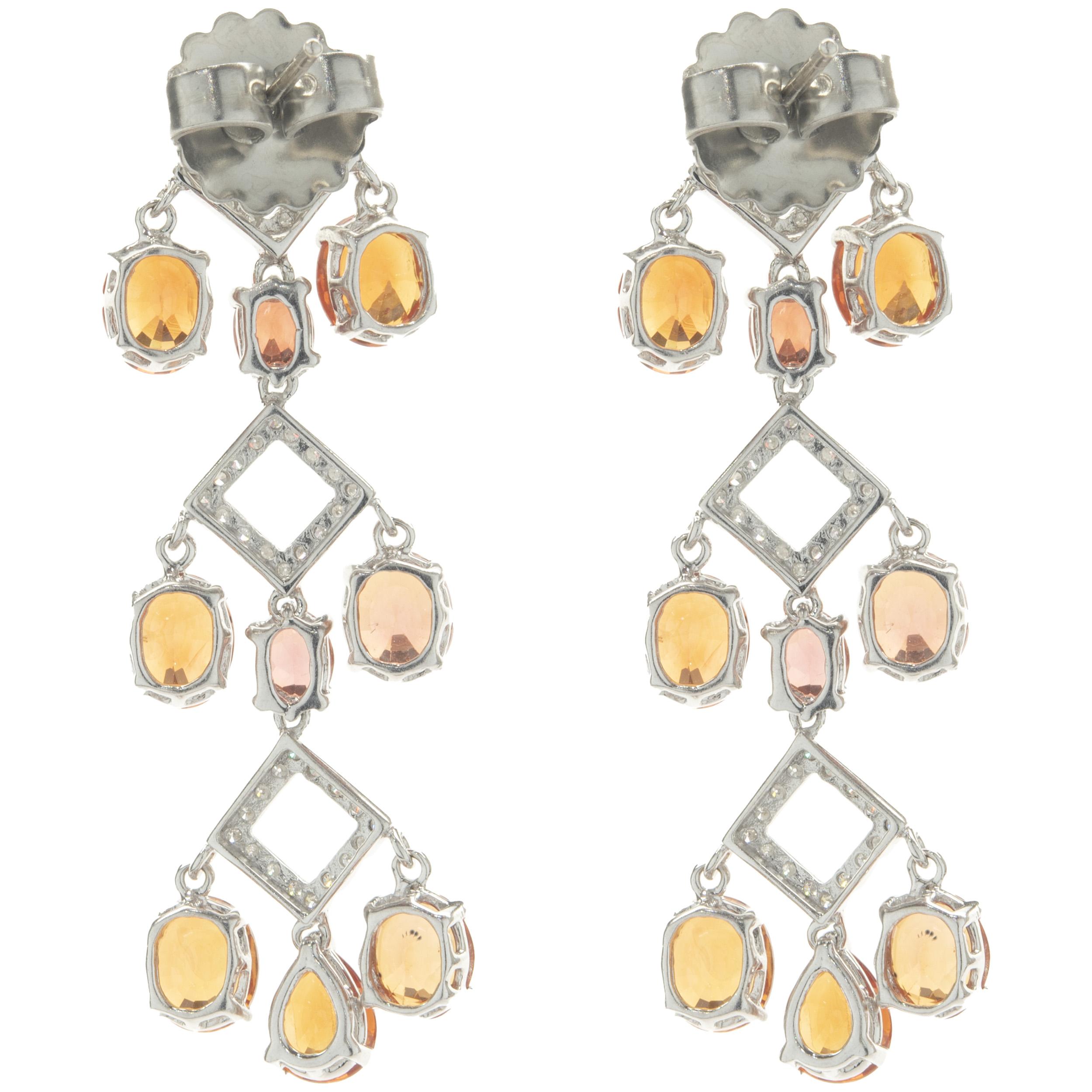 Round Cut 14 Karat White Gold Orange Sapphire and Diamond Three Tier Drop Earrings For Sale