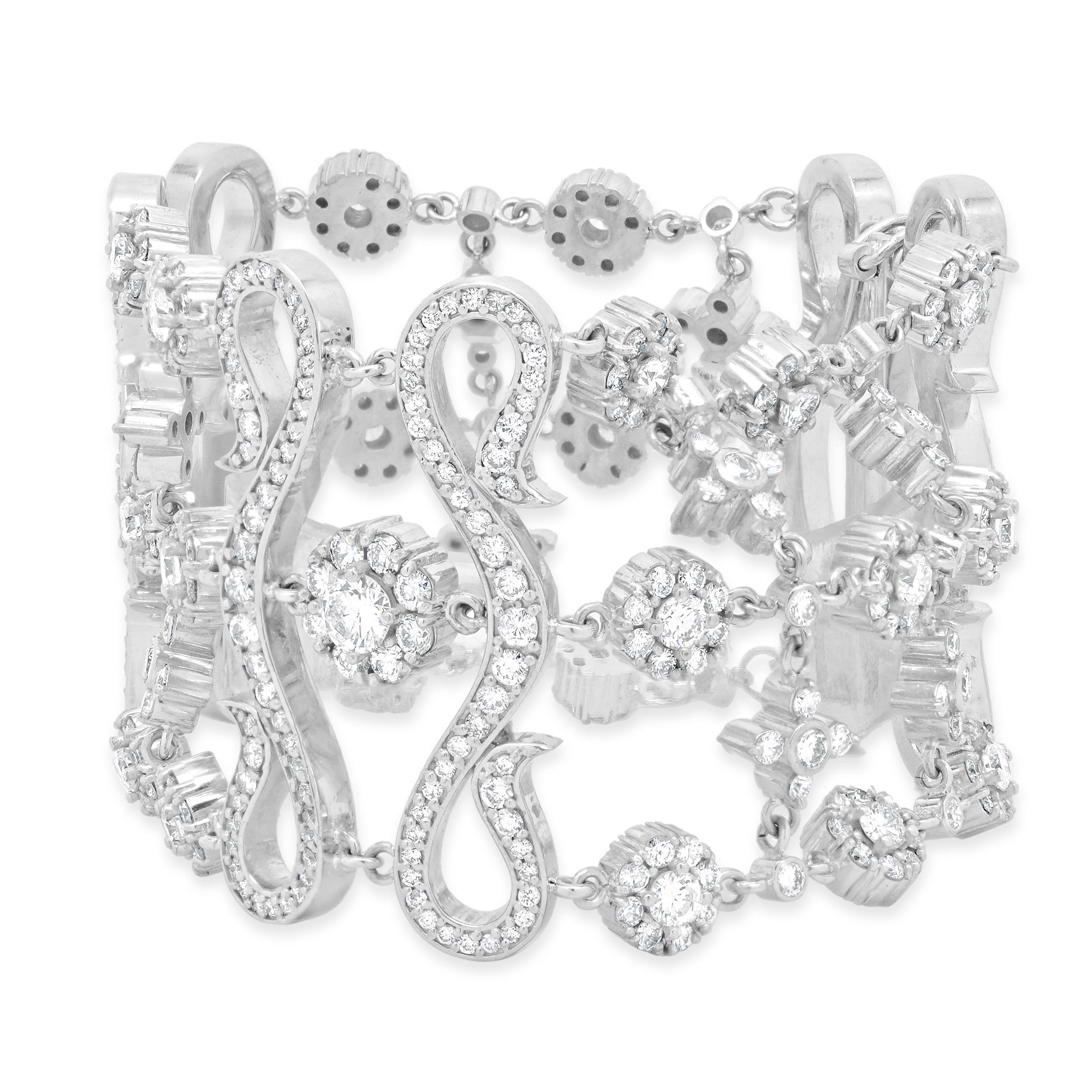 Designer : design personnalisé
Matériau : Or blanc 14k
Diamants : Poids total : 19,02 carats
Couleur : G-H
Clarté : VS-SI1
Dimensions : bracelet de 7 1/2 pouces de long
Poids : 100 grammes