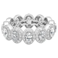 14 Karat White Gold Oval and Round Diamond Halo Eternity Band