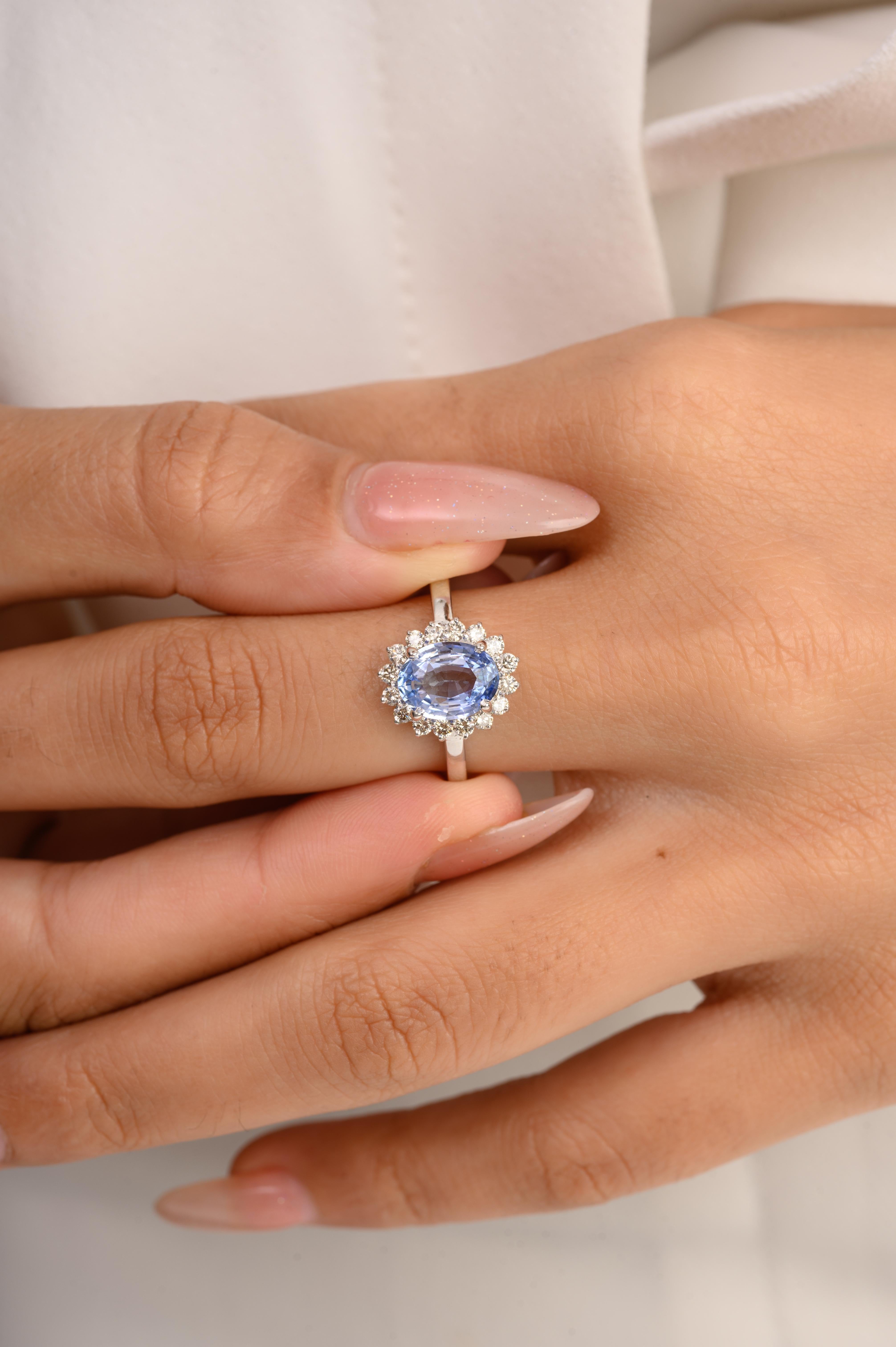 in vendita:  Anello di fidanzamento in oro bianco 14 carati con zaffiro blu ovale e diamante a raggiera per lei 4